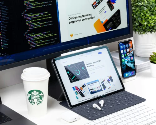 Modern web design showcase featuring responsive layouts on multiple devices